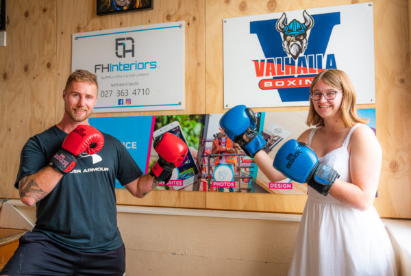 MoMac showcasing their graphic design at Valhalla Boxing in Rangiora